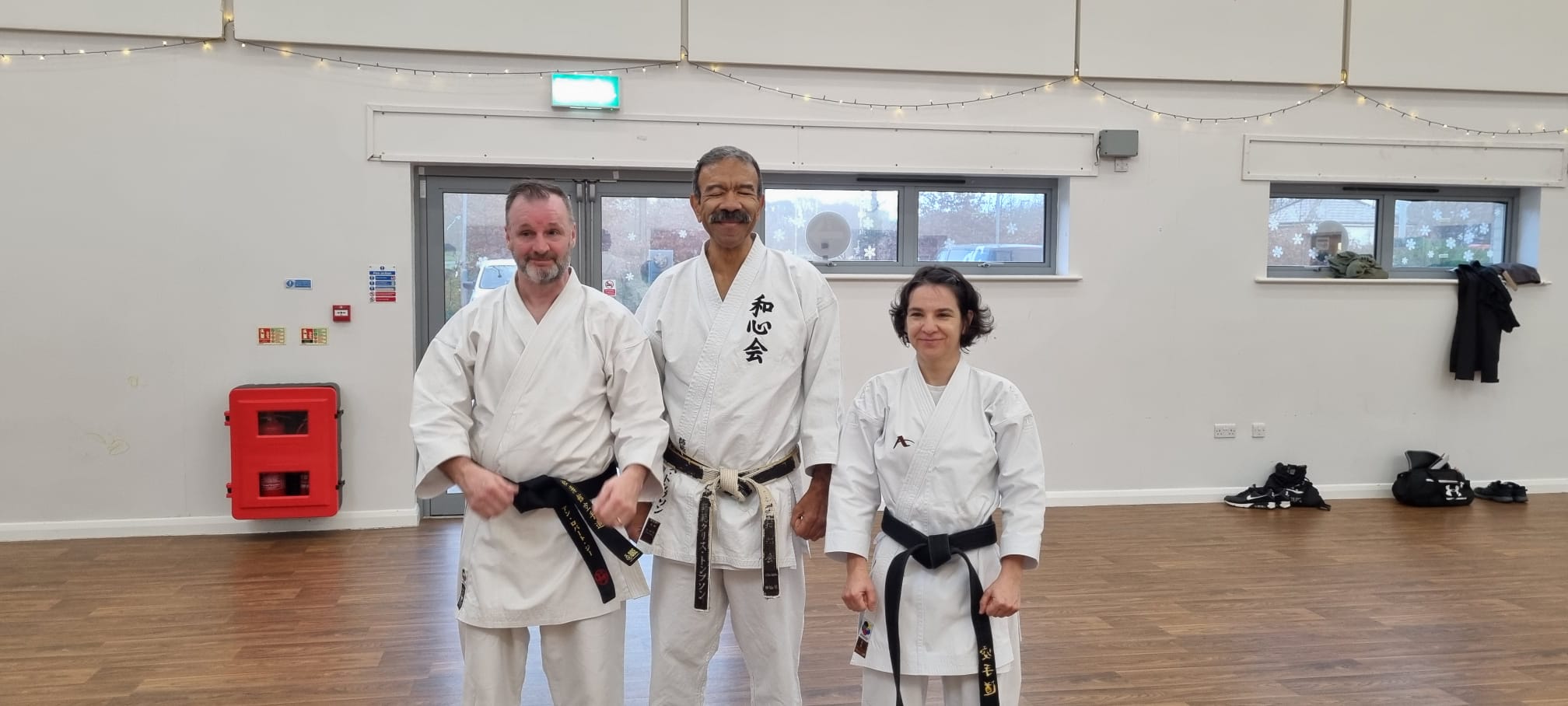 Ana-Maria Apostol and Ian Gee after their Shodan Grading with Shihan Thompson